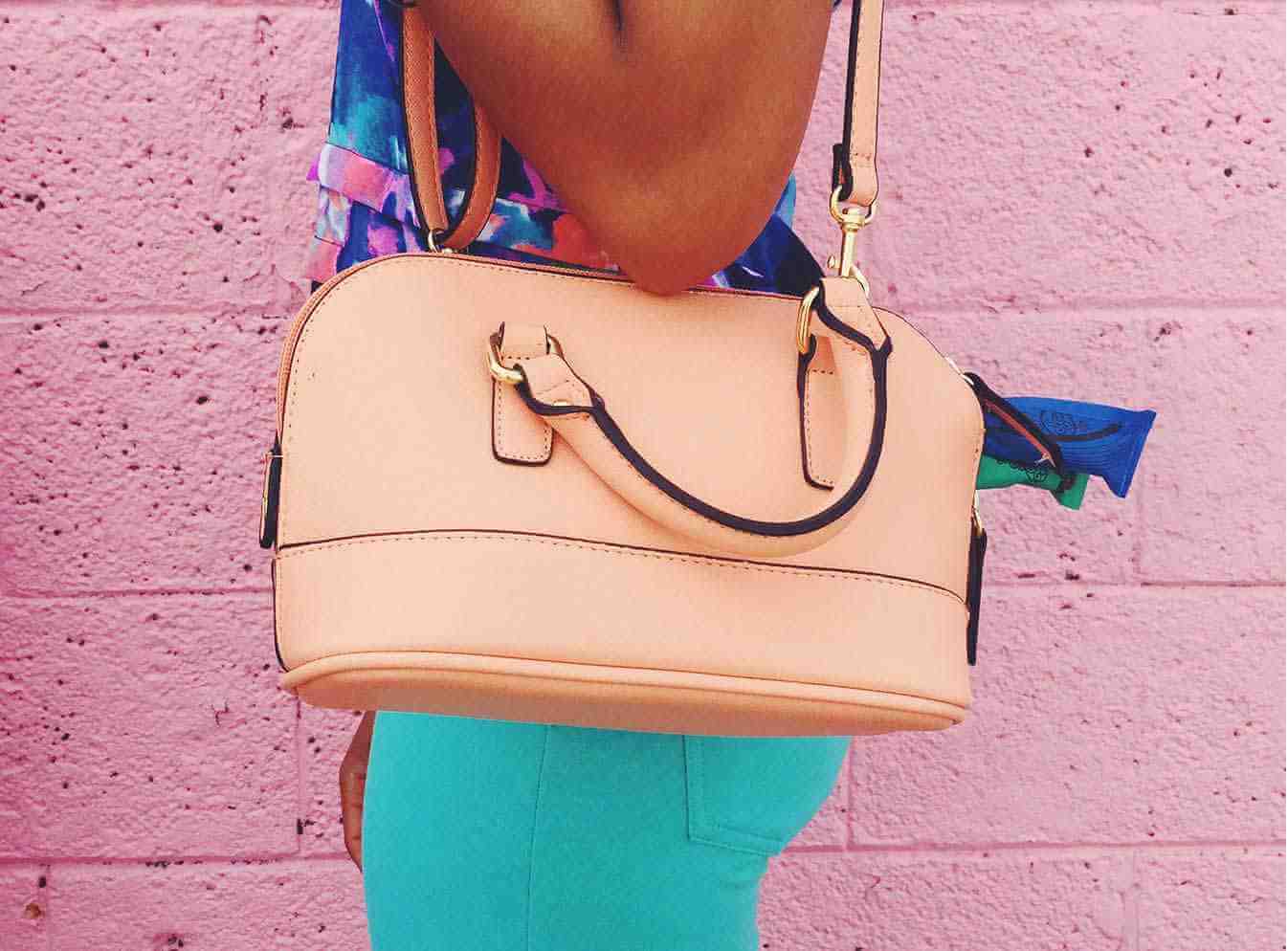 Peach shoulder bag with tampons